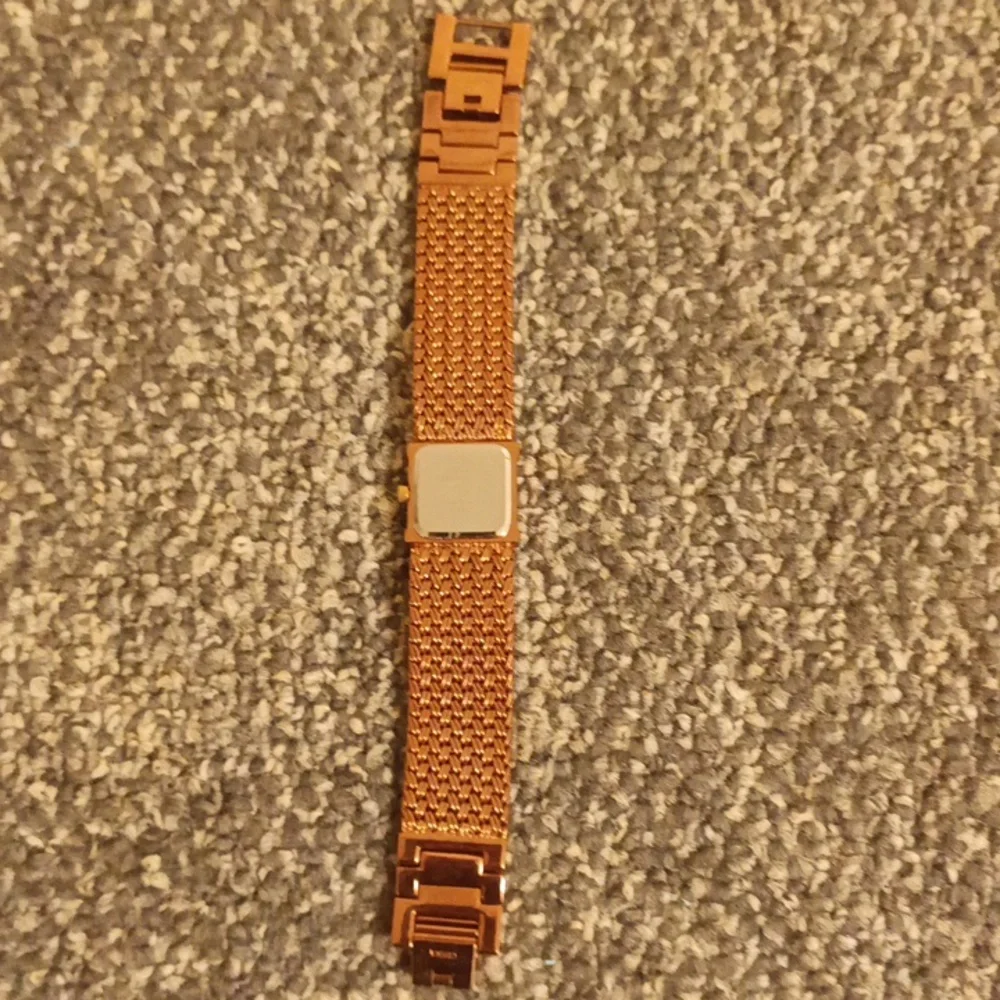 Anne Klein mother pearl rose gold women's watch